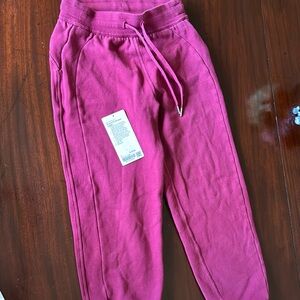 Lululemon Scuba HR Relaxed Jogger Size 4 Color POME pomegranate, some fading.